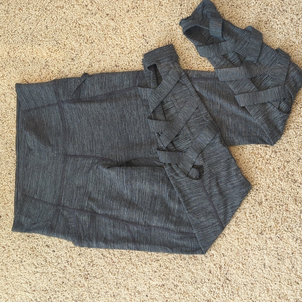 Grey athleta leggings with criss cross cutout design size M